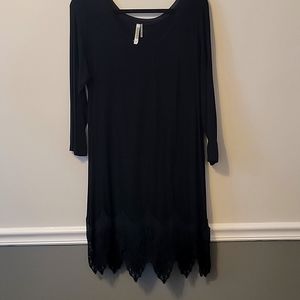 Cute Large Tunic or dress with lace bottom. Paired with cowboy boots super cute!